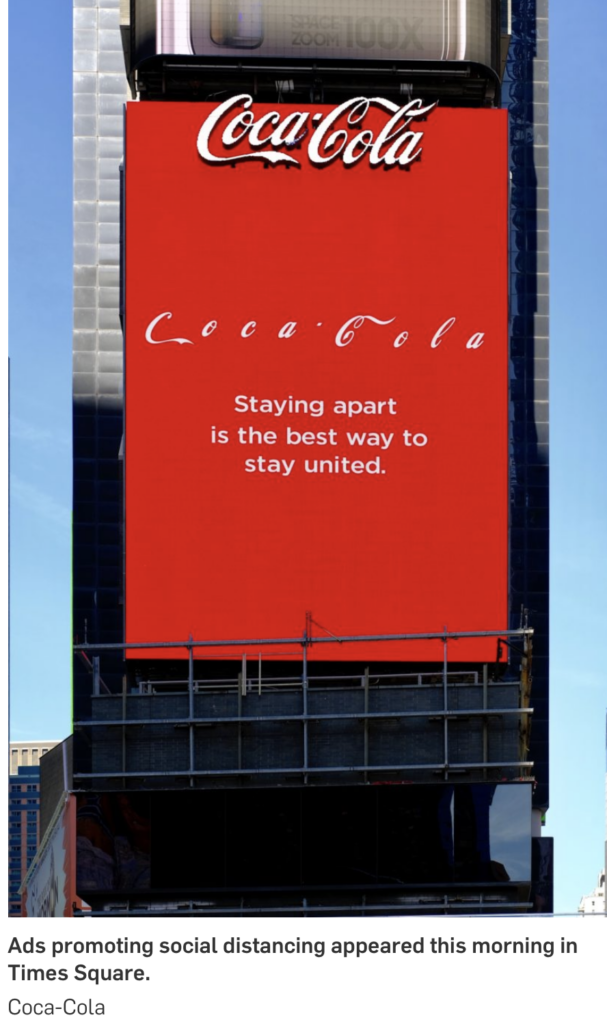 Coca-Cola ad promoting social distancing in Times Square, NY
